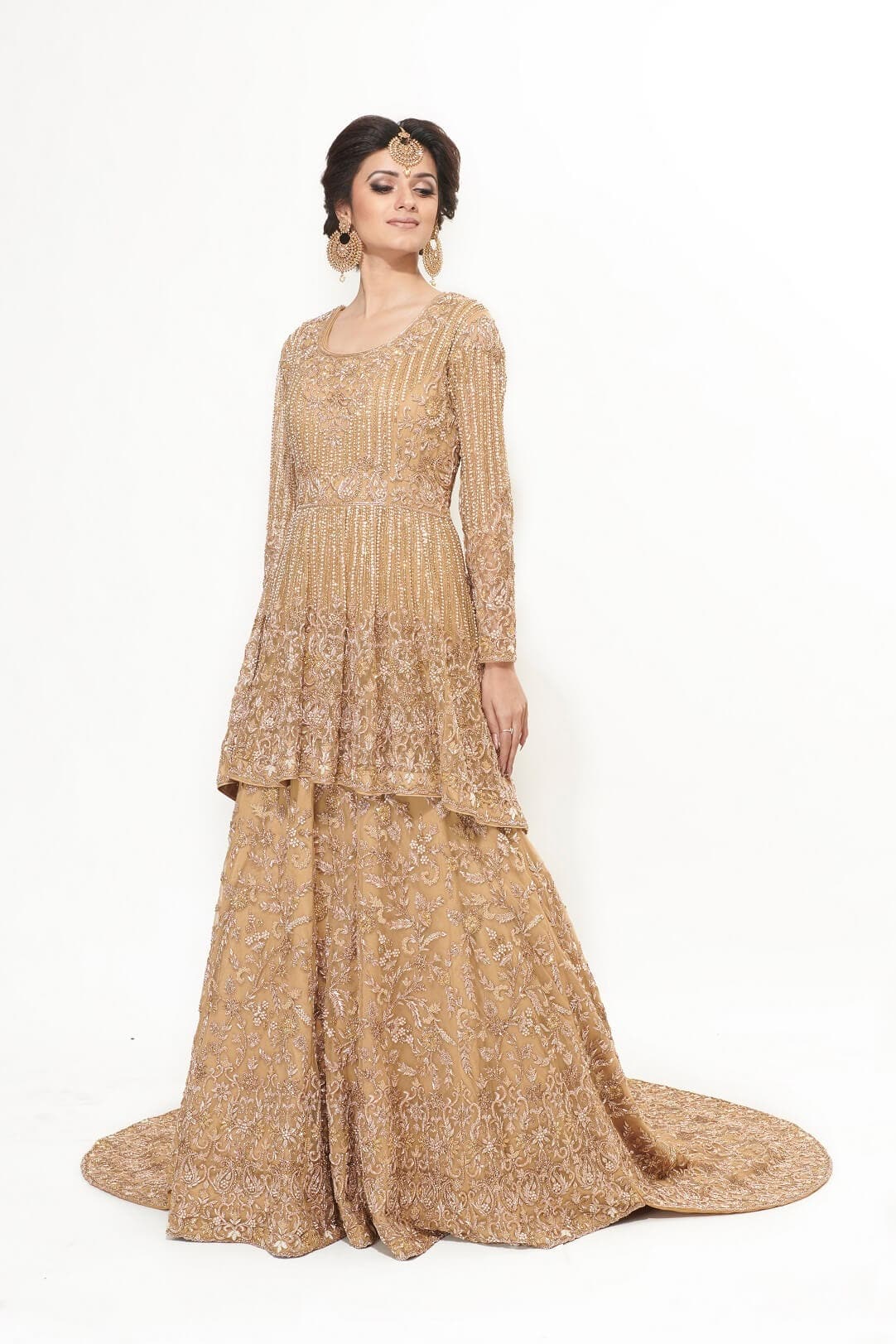 Gold peplum with trail