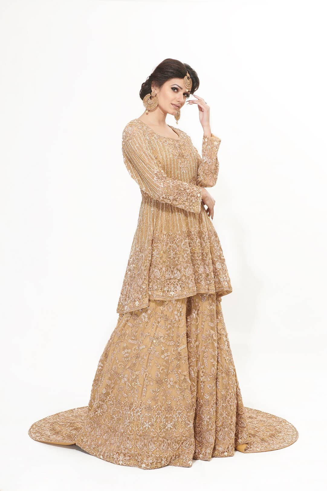 Gold peplum with trail
