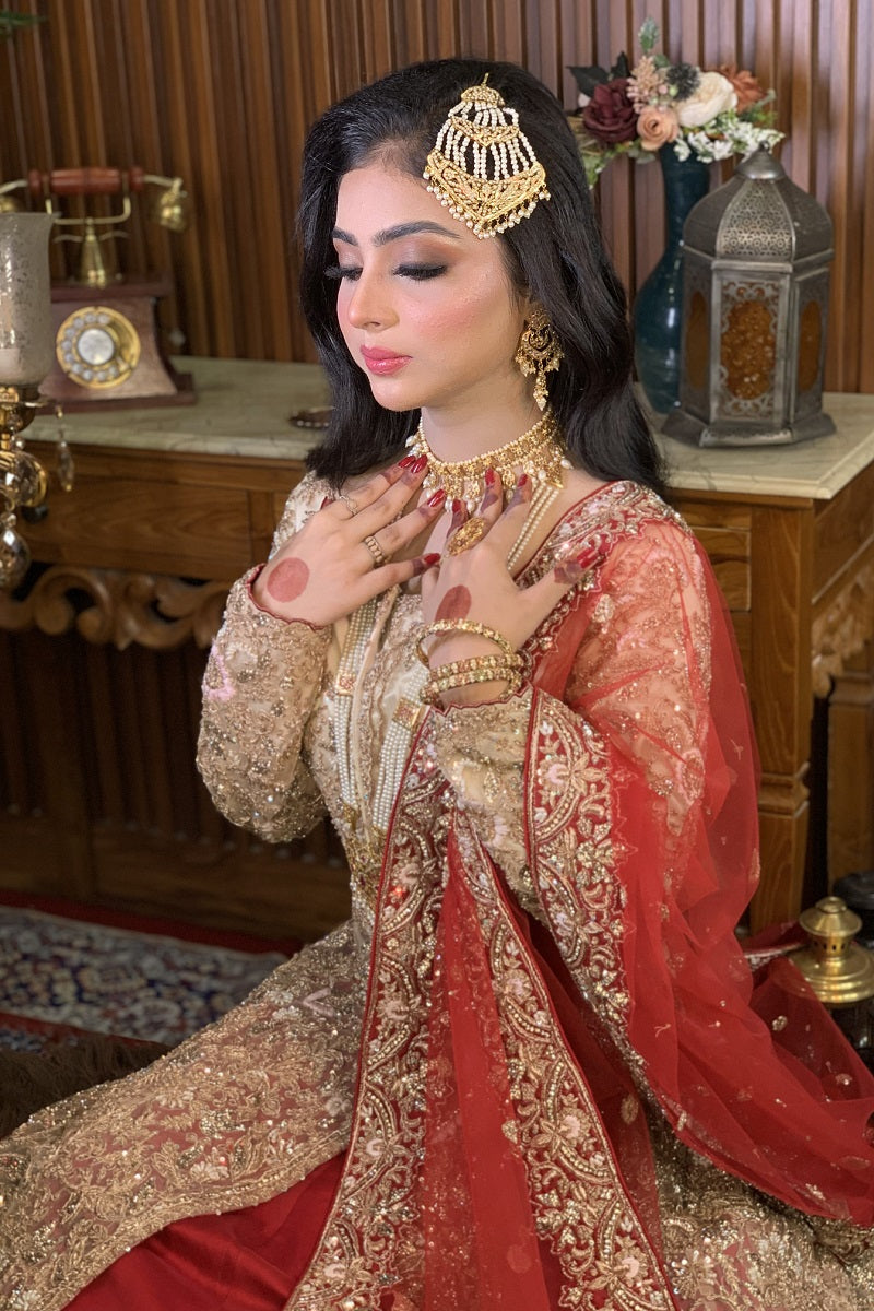 Ivory jacket with red lehenga